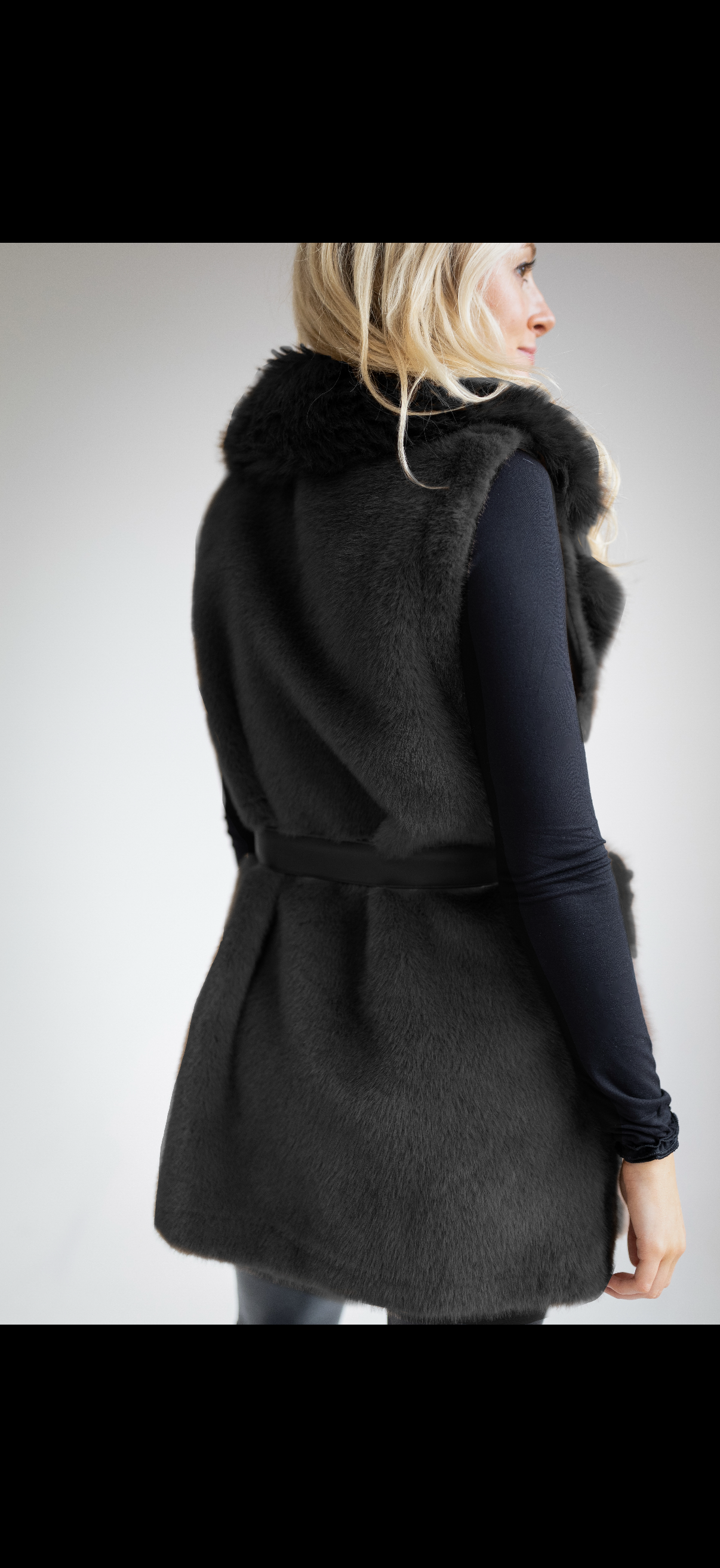 Faux Fur vest with leather belt