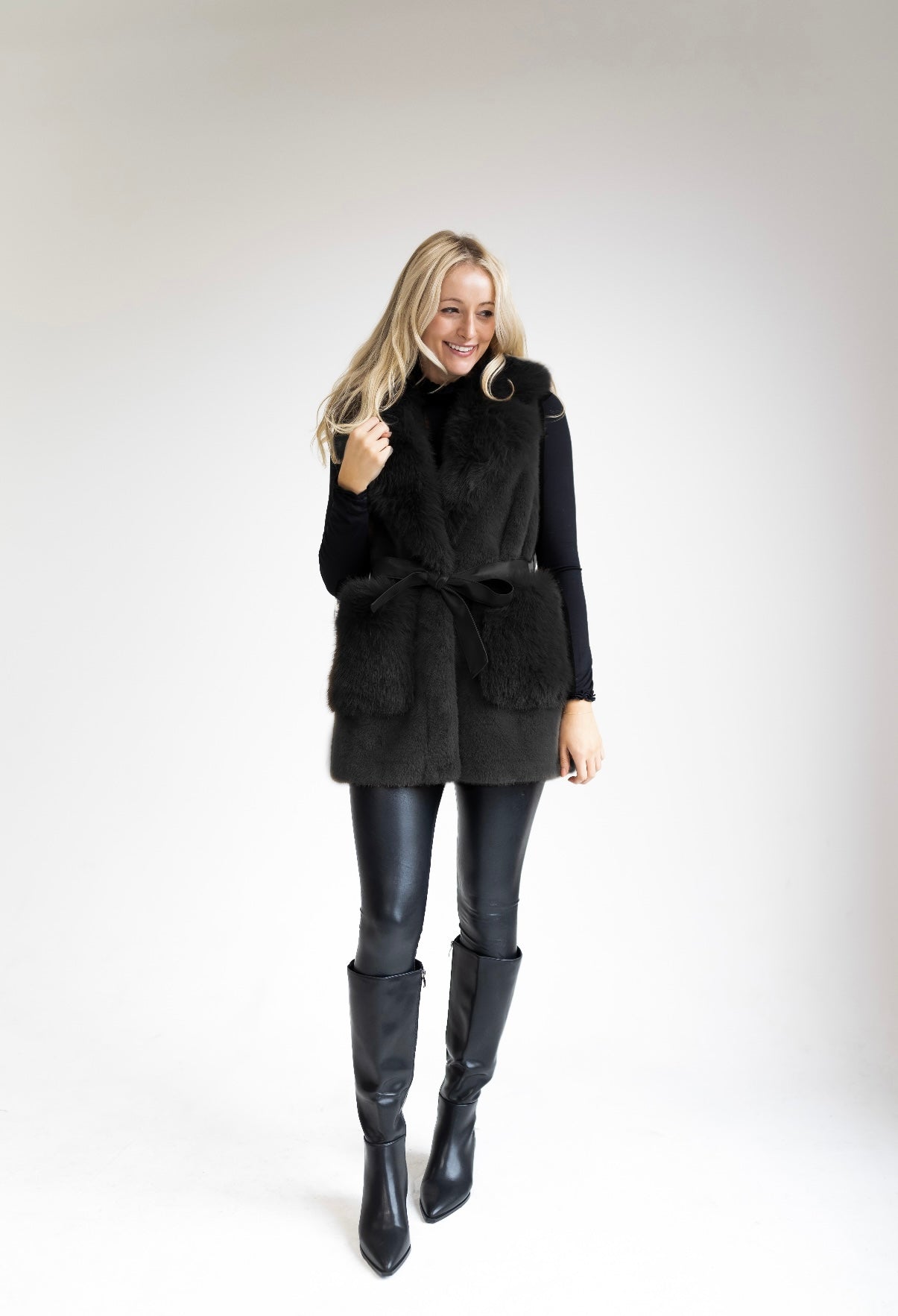 Faux Fur vest with leather belt